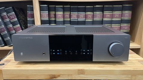 Cambridge Audio EXA100 integrated amplifier on hi-fi rack in front of books