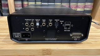 Cyrus 40 ST music streamer on wooden hi-fi rack rear view showing connections