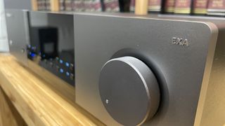 Cambridge Audio EXA100 integrated amplifier side angle close up on control dial